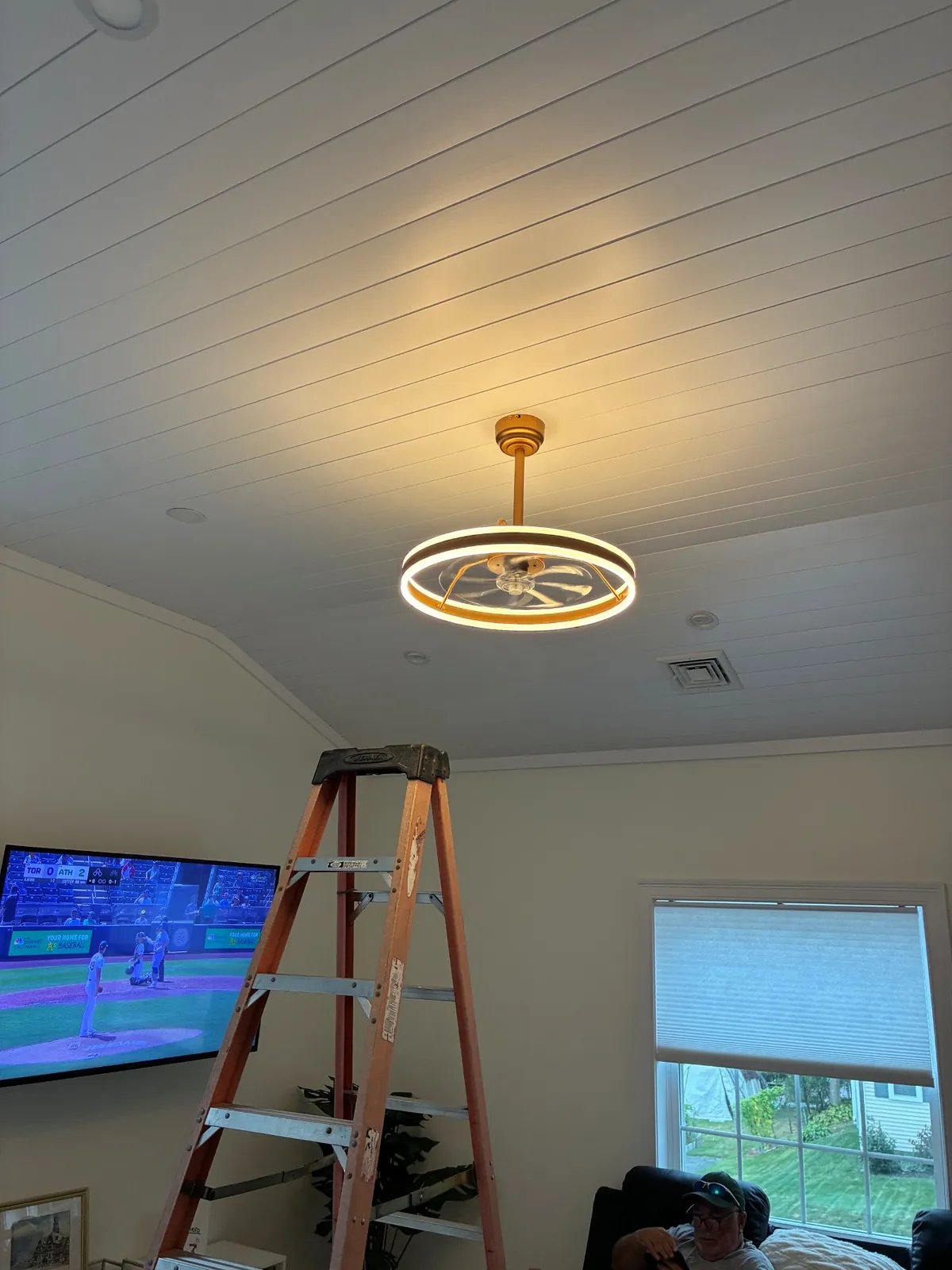 LED ring ceiling fan installed in a living room